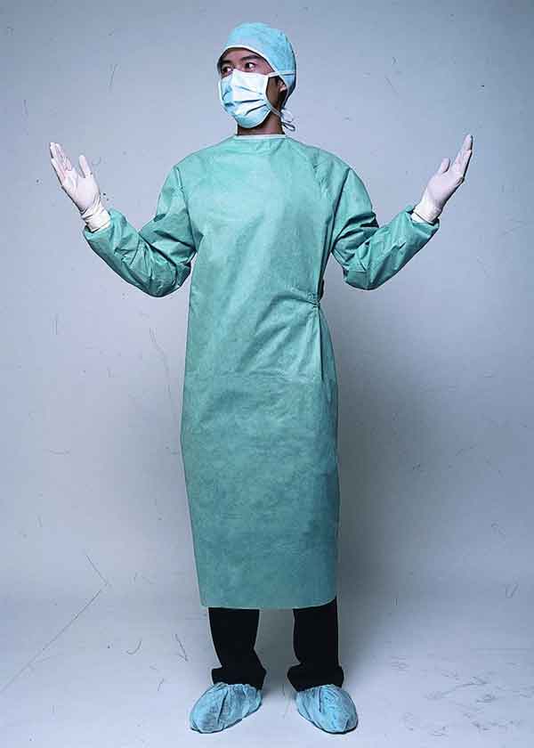 As combinações descartáveis do polipropileno, vestidos cirúrgicos impermeáveis impedem a infecção transversal