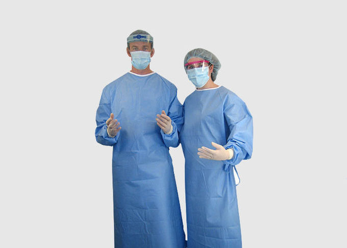 Vestido protetor médico do fato da cor azul com os laços no pescoço/cintura